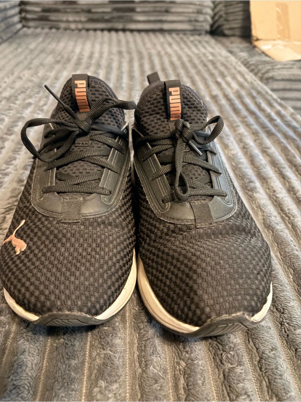 Puma Women’s Black Sneakers with Rose Gold Logo